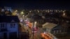 Firefighters work at a site of a plane crash into residential building in the city of Irkutsk, Russia, Oct. 23, 2022, in this still picture taken from a video. 