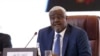 FILE - African Union (AU) Commission Chairperson Moussa Faki Mahamat attends a signing ceremony in Doha on Aug. 8, 2022 between Chad's military ruler and more than 40 opposition groups to launch national peace talks.