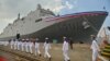 Taiwanese navy soldiers walk by a Yushan-class landing platform dock during in Kaohsiung on Sept. 30, 2022. 