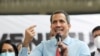 ARCHIVO - Juan Guaidó, líder opositor venezolano, habla con la prensa luego de las elecciones parlamentarias en Caracas, el 8 de marzo de 2021.