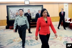 美国国家安全事务顾问苏珊•赖斯在北京八一大楼会见中国中央军委副主席范长龙（2014年9月9日）