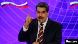 El presidente de Venezuela, Nicolás Maduro, durante un reciente acto oficial con el viceprimer ministro ruso, Yuri Borisov, en Caracas, el 16 de febrero de 2022.