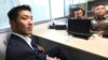 The leader of the political party named Future Forward Party, Thanathorn Juangroongruangkit arrives at the Technology Crime Suppression Division to hear police charges in Bangkok, Thailand, Monday, Sept. 17, 2018. 