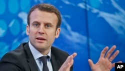 Mantan Menteri Ekonomi Perancis, Emmanuel Macron dalam acara Debat di Forum Ekonomi Dunia di Davos, Swiss, 22 Januari 2016 (AP Photo/Michel Euler).