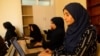 In this photo taken on Sept. 4, 2019 Afghan students attend a class at the Code to Inspire school in Herat.