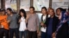 Calon presiden dari PDI-Perjuangan, Joko Widodo, bertemu grup rock Indonesia Slank, di markas mereka di Jakarta Selatan (27/5). (VOA/Andylala Waluyo)