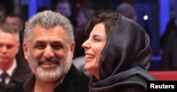 مانی حقیقی در کنار لیلا حاتمی روی فرش قرمز جشنواره برلین