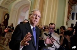 FILE - Senate Majority Leader Mitch McConnell of Kentucky speaks to reporters on Capitol Hill, April 4, 2017.