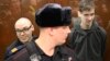 Артем Камардин (слева) и Егор Штовба во время оглашения приговора в суде в Москве 28 декабря 2023 года.