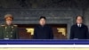 2011년 12월 평양 김일성 광장에서 열린 부친 김정일 위원장의 추도대회에 참석한 김정은 북한 국방위원회 제1위원장(가운데). (자료사진)