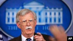 FILE - National security adviser John Bolton speaks to reporters during the daily press briefing in the Brady press briefing room at the White House in Washington, Nov. 27, 2018. 
