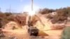 A still image taken from a video footage and released by Russia's Defence Ministry on November 15, 2016, shows Russian Bastion coastal missile launchers launching Oniks missiles at an unknown location in Syria. 