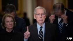 (FILES) US Senate Minority Leader Mitch McConnell, Republican of Kentucky, speaks during a press conference after Republican senators met during a policy luncheon at the US Capitol in Washington, DC, on January 17, 2024.