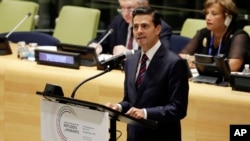 Mexico's President Enrique Peña Nieto addresses the United Nations Summit for Refugees and Migrants, in the Trusteeship Council Chamber of the United Nations, Sept. 19, 2016. 