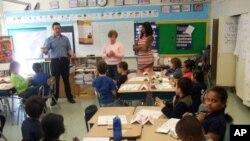 Junior Achievement brings business people to classrooms to share their experiences with students