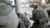 Soldiers of Israel's Paratroopers Brigade take part in an operation at a location given as Gaza