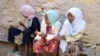This image taken on Sunday Dec. 5, 2010, shows Ethiopian young girls waiting to travel to Yemen in Bossaso, the commercial city of the semi-autonomous region of Puntland and the launching pad of the people trying to cross the Gulf of Aden to Yemen. 