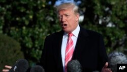 President Donald Trump speaks to reporters before leaving the White House, Nov. 21, 2017, in Washington.