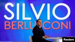 FILE - Italy's former Prime Minister Silvio Berlusconi is seen during the television talk show "L'aria che tira" in Rome, Jan. 18, 2018. 