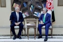 U.S. special representative for Afghanistan, Zalmay Khalilzad, left, meets with Afghanistan Chief Executive Abdullah Abdullah in Kabul, Afghanistan, Sept. 2, 2019.
