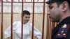 Надежда Савченко (на фото слева)