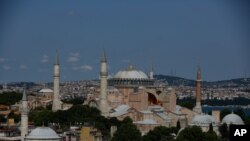 An aerial view of the Byzantine-era Hagia Sophia, one of Istanbul's main tourist attractions in the historic Sultanahmet district of Istanbul, Saturday, April 25, 2020. The 6th-century building is now at the center of a heated debate between…