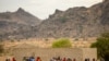 FILE - Villagers are seen gathered in Maroua, northern Cameroon, April 18, 2016. Boko Haram militants have again been stepping up attacks in the northern part of the country in recent months. 