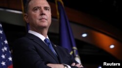 U.S. House Intelligence Committee Chairman Adam Schiff, D-Calif., joins Speaker of the House Nancy Pelosi to talk about their legislative priorities and impeachment inquiry plans during her weekly news conference at the Capitol in Washington, Oct. 2, 2019