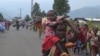 Displaced families flee renewed fighting between the Congolese Revolutionary Army (CRA) and Congolese army in Mugunga, near Goma, November 22, 2012. 