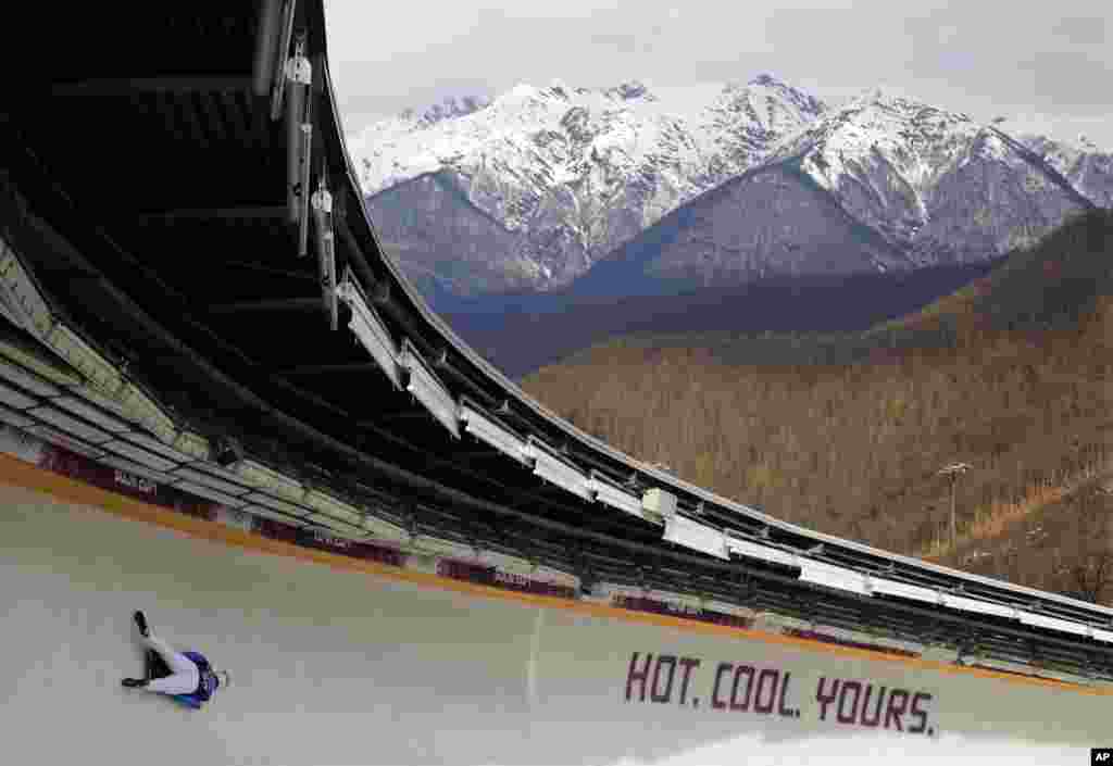 Alexandros Kefalas of Greece speeds down the track during a training session for men&#39;s skeleton, Krasnaya Polyana, Russia, Feb. 10, 2014.