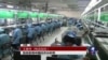 英媒指中国经济总量将在今年跃居世界第一