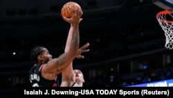 Kawhi Leonard, à gauche, Denver, Colorado, le 16 décembre 2018. (Isaiah J. Downing-USA TODAY Sports)